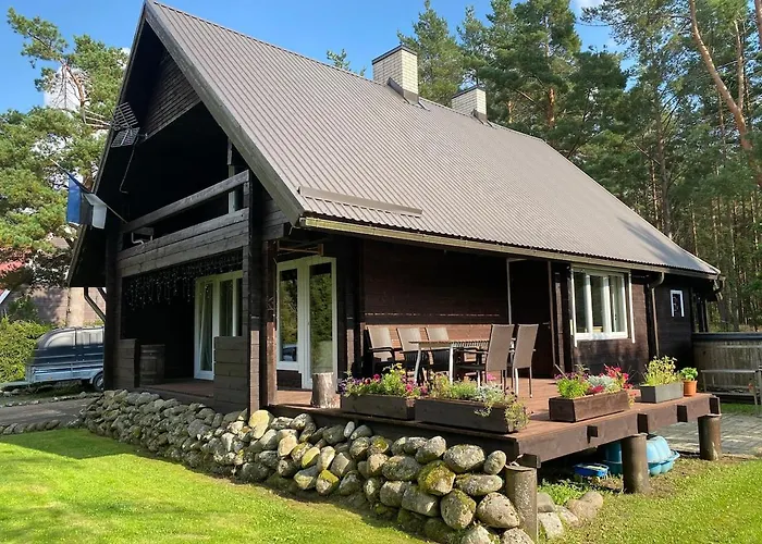 Cozy Loghouse With Sauna Near A Great Sandy Ferienhaus