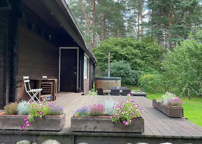 Ferienhaus Cozy Loghouse With Sauna Near A Great Sandy Syytme